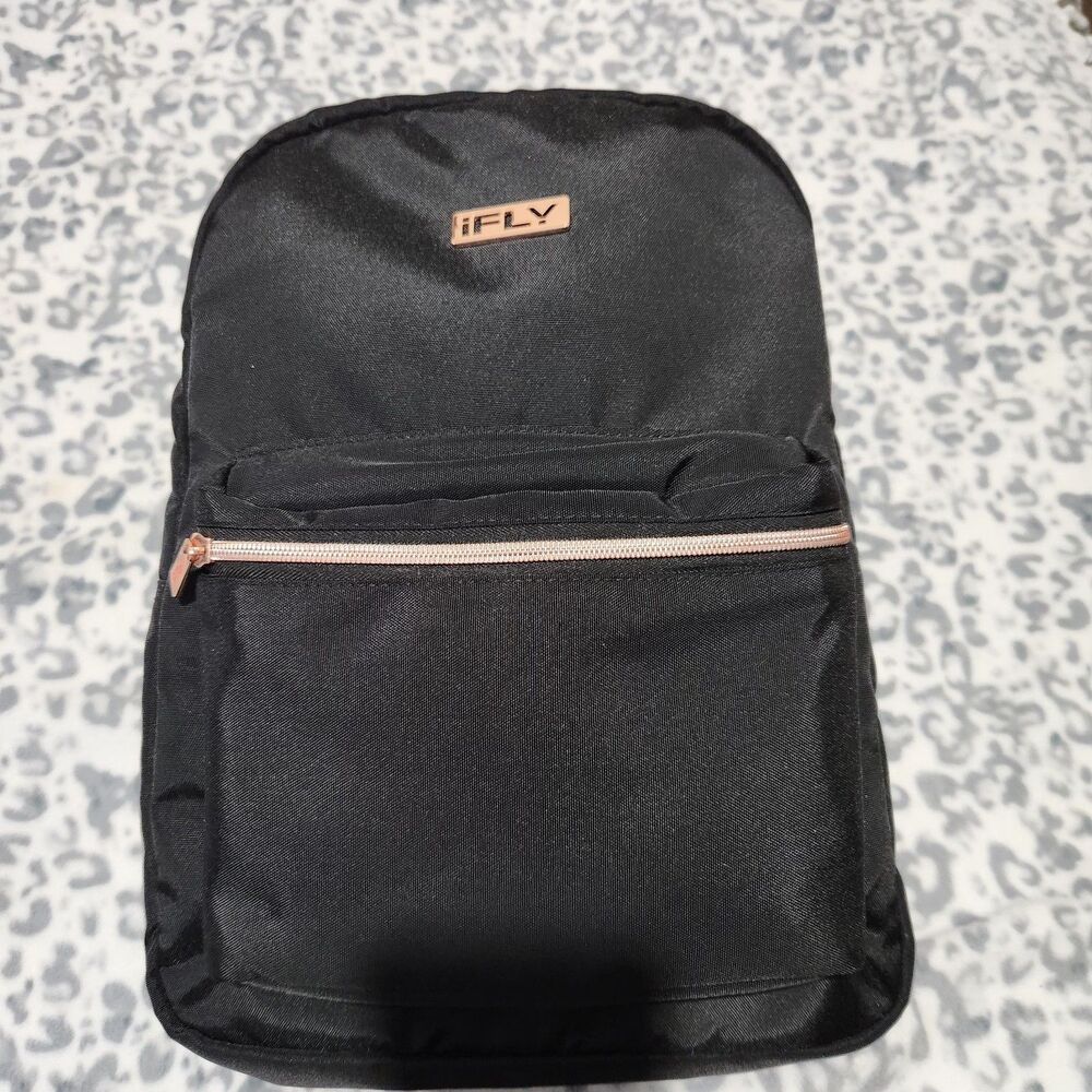 Ifly Travel Backpack Black 18x11x5 Durable Fabric And Metallic Hardware.